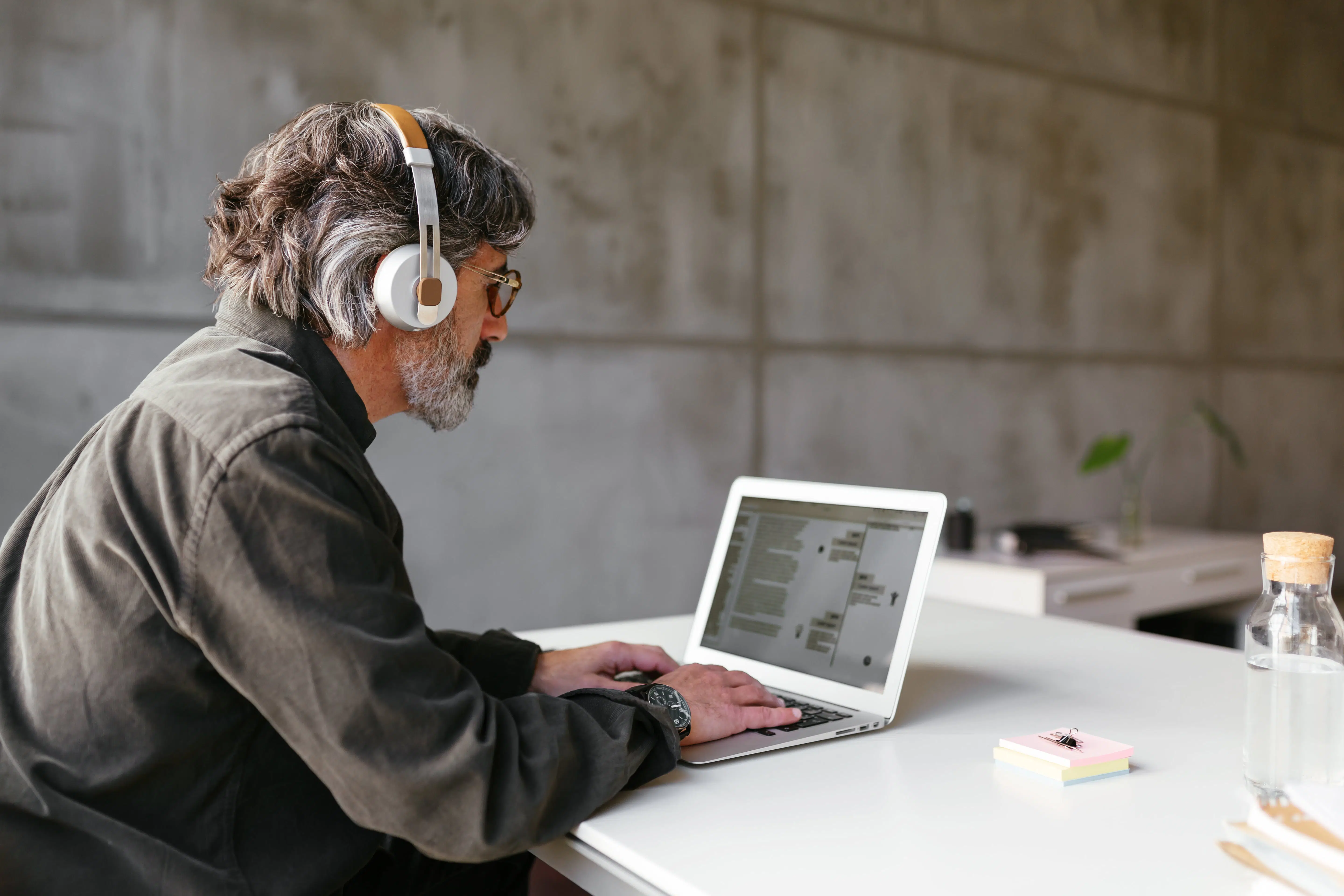 Man conducting a policy evaluation on a computer